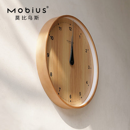 The original wood grain silent and simple wooden wall clock is a fashionable home decoration for the living room clock