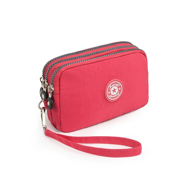 The 3-layer zipper clutch is lightweight, compact and versatile for ladies. It can be used with mobile phones or loose change