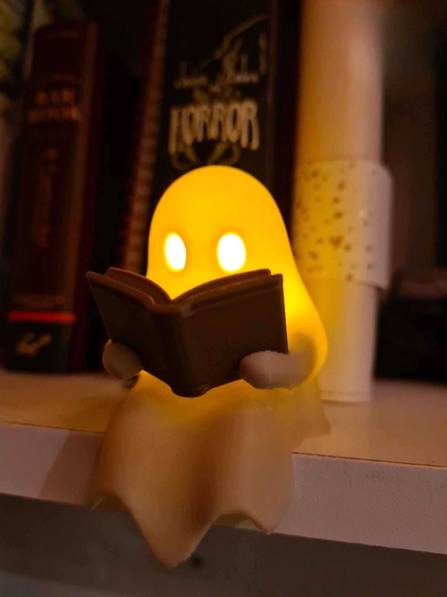 Halloween Party Decoration Favors Cute Little Ghost Sitting on A Shelf Reading A Book with Flickering Ornament Gift Spooky Idea