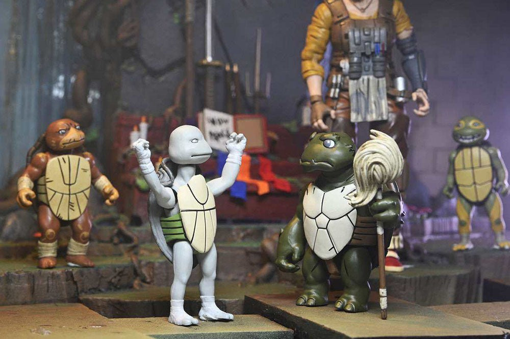 NECA 54409 Tartarugas Ninja Casey Marie com Bebê Odyn e Uno The Last Ronin The Lost Years