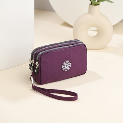 The 3-layer zipper clutch is lightweight, compact and versatile for ladies. It can be used with mobile phones or loose change
