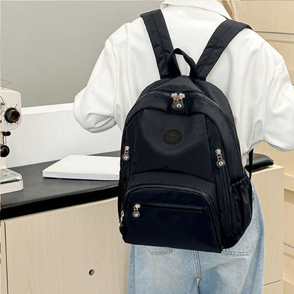 Neutral color schoolbag for both men and women, dual shoulder backpack, travel and commuting backpack, simple design backpack