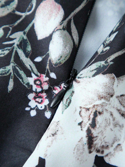 A lady's elegant half skirt with a bow tie and large flowers