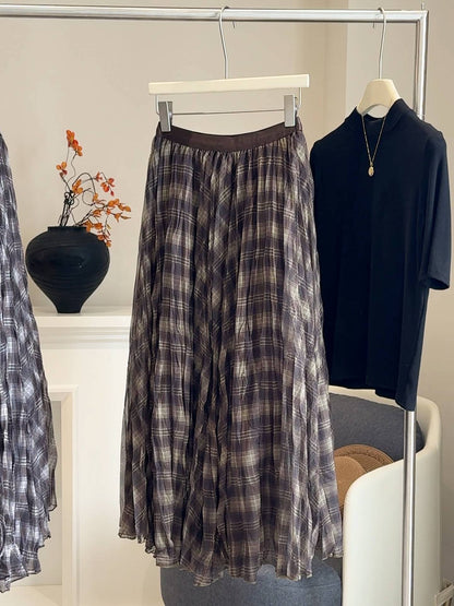 Mesh splicing color blocking plaid midi skirt for women in autumn 2025, new high waisted drape pleated loose umbrella skirt