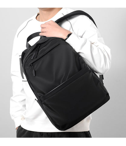 Mochila de negócios masculina de novo estilo, nylon, cor sólida, grande capacidade, mochila escolar para estudantes, mochila de viagem em promoção