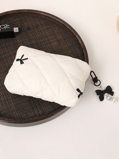 Simple bow quilted clutch, portable everyday small item pouch for lipstick, earphones, and change, soft travel makeup bag