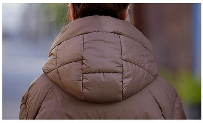 Mid to Long Down Jacket Knee Length 2024 Winter New Item Thickened Warm Fashionable Loose Versatile Jacket Women's Solid Color