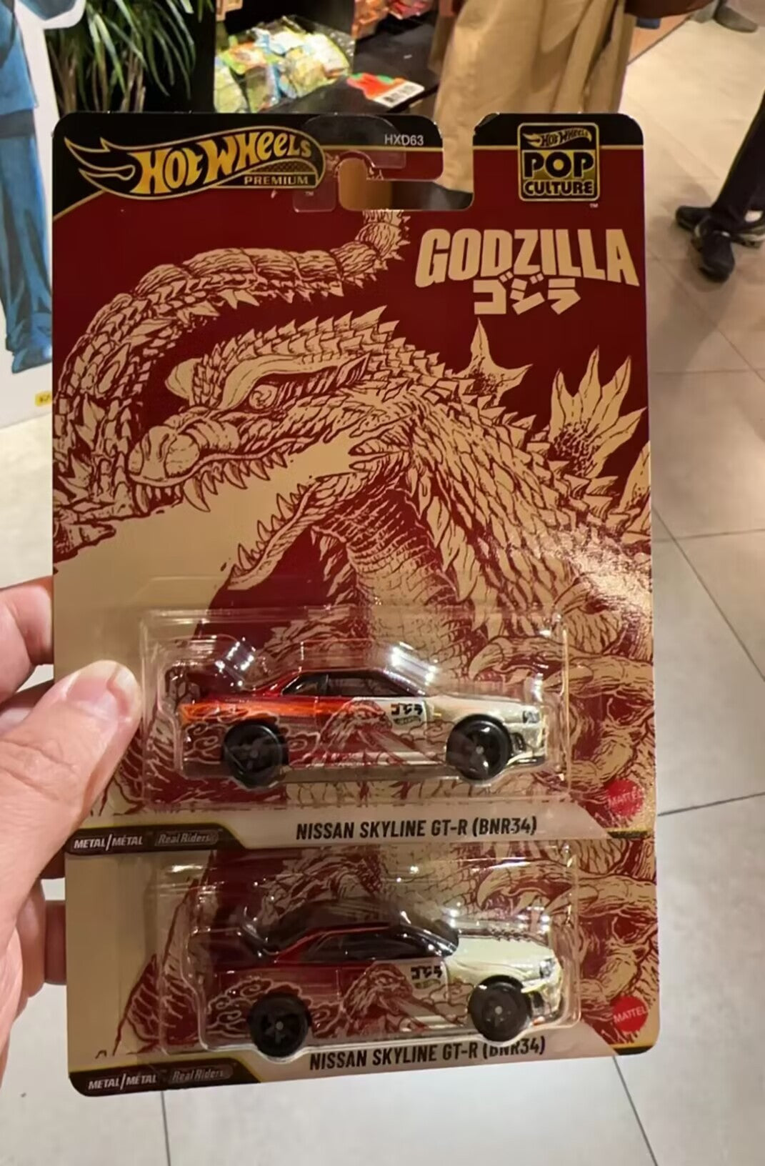 Hot Wheels Premium Carro de Cultura Pop Escala 1/64 - Nissan Skyline Gt-R Godzilla - Brinquedo Colecionável Para Meninos Presente de Natal