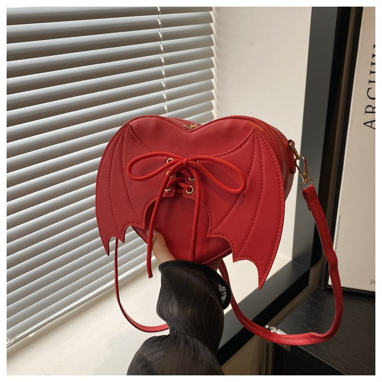 New trendy and personalized wing shoulder bag, versatile ins crossbody shaped bag New trendy and personalized wing shoulder bag,
