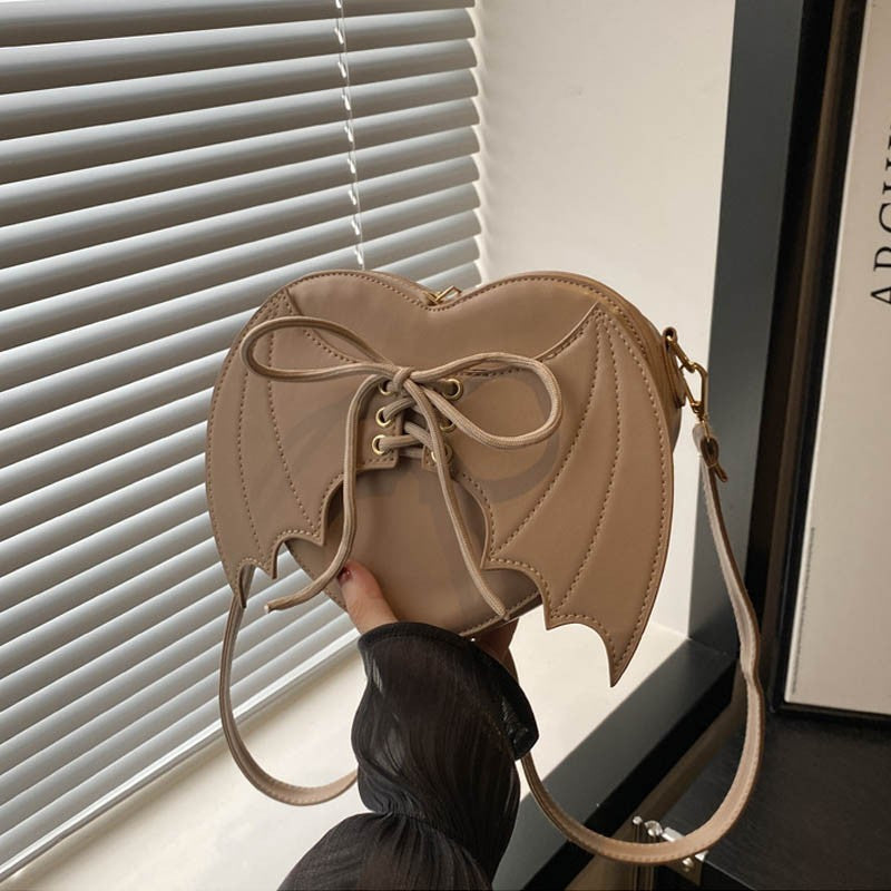 New trendy and personalized wing shoulder bag, versatile ins crossbody shaped bag New trendy and personalized wing shoulder bag,