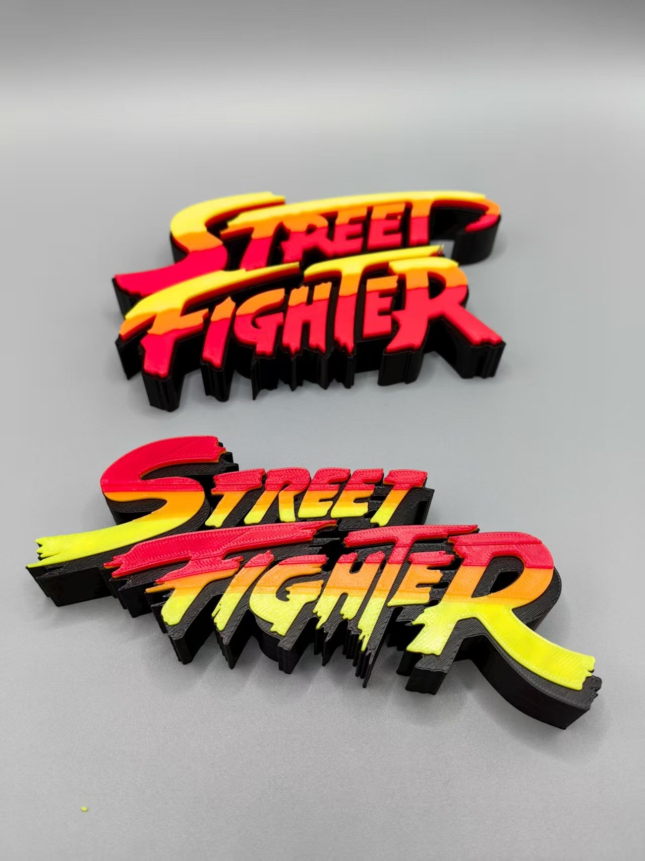Street Fighter, Street Fighter (abbreviation), arcade game, Street Fighter Logo, signboard, action figure, ornament.