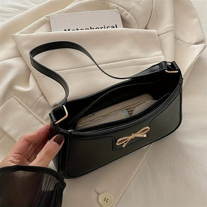 Chic Black Crescent Shoulder Bag for Women Elegant Underarm Purse with GoldenTone Bow Detail Polyester Lined Stylish PU Tote Bag