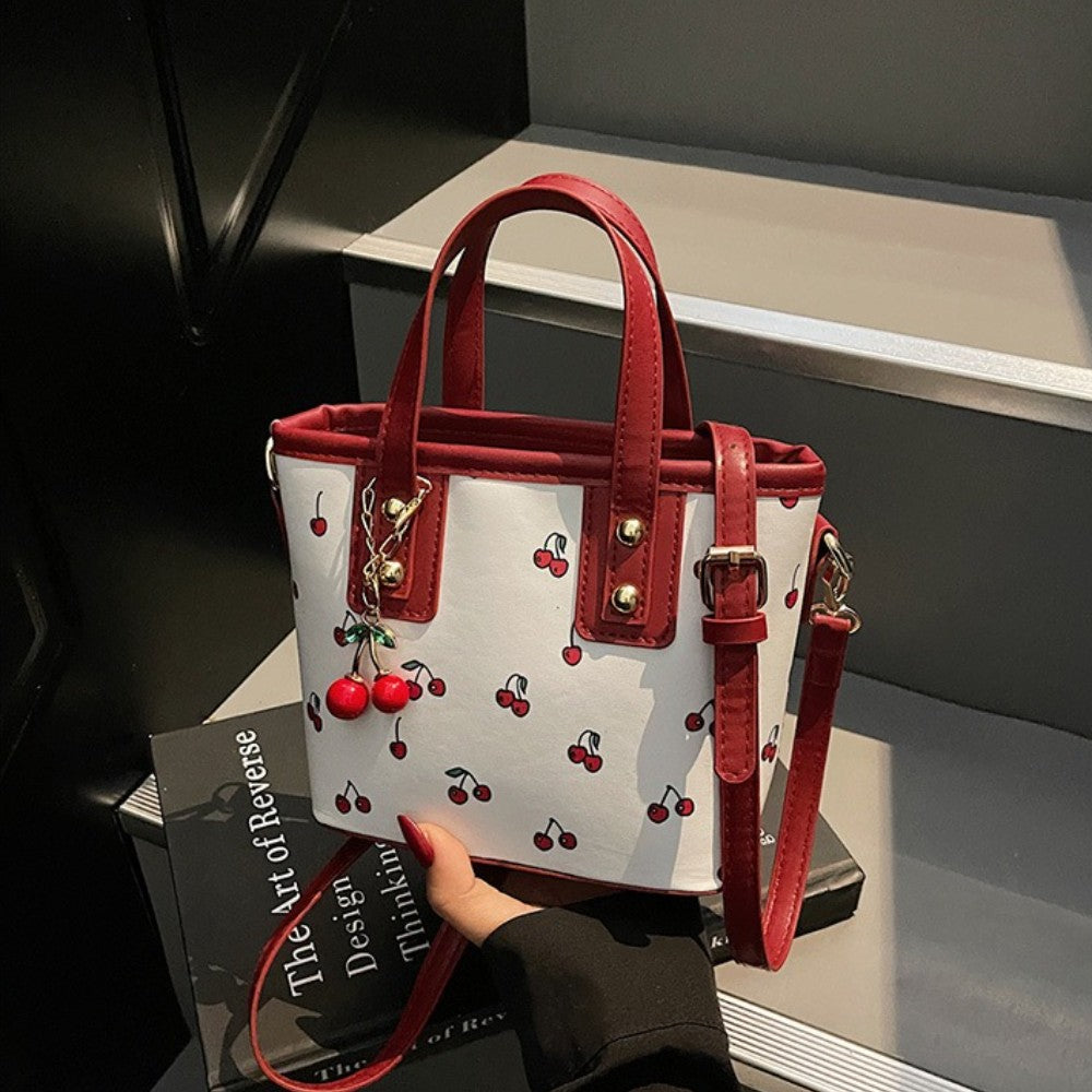 Women PU Cherry Shoulder Bag Large Capacity Trendy Commuting Bag with Cherry Pendant Stylish Crossbody Bag Aesthetic Handbag