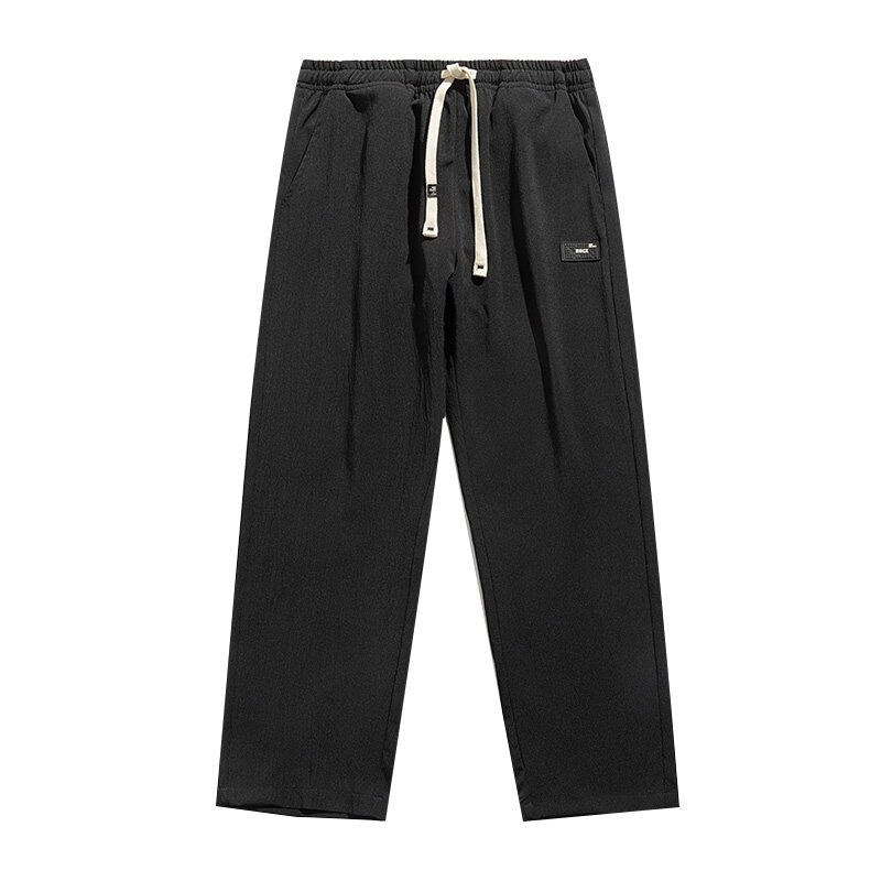 Calças Casuais Retas Masculinas 2025 Calças Jogger Coreanas Clássicas com Cintura Elástica Azul Preto Cinza Marca Masculina Calças Tamanho Plus Size 4XL 5XL