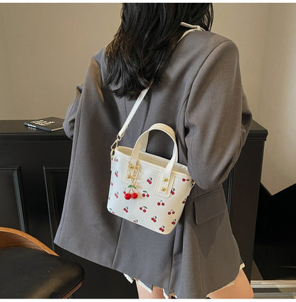 Women PU Cherry Shoulder Bag Large Capacity Trendy Commuting Bag with Cherry Pendant Stylish Crossbody Bag Aesthetic Handbag